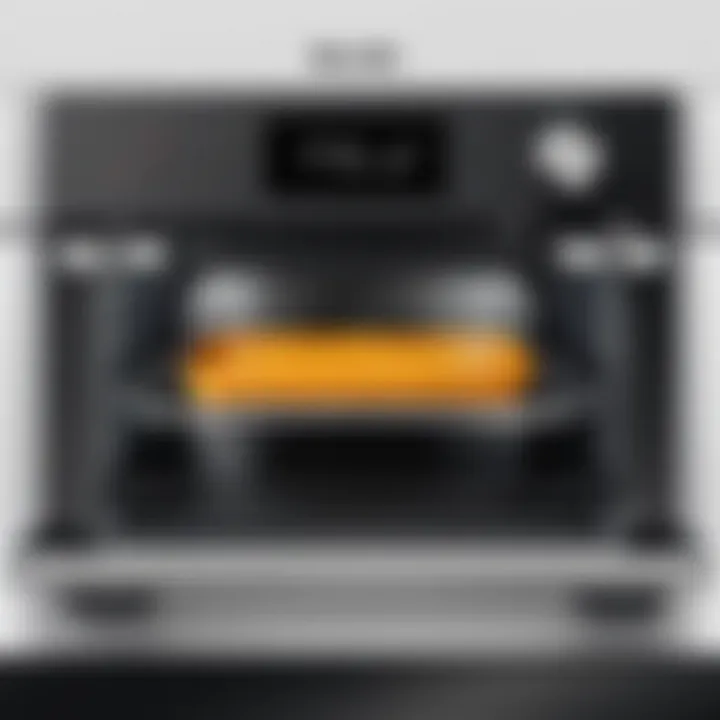 Breville Mini Smart Oven with crumb tray installed, highlighting its integration.
