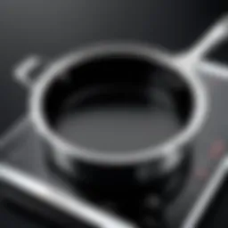 Close-up view of the Calphalon Premier 3.5 Qt Saucepan showcasing its sleek design and polished surface.