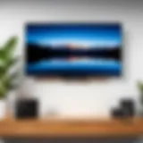 Different types of flat screen TV mounts displayed on a wall