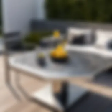 Stylish Steel Patio Table in Modern Outdoor Setting Stylish steel patio table featuring an umbrella hole in a modern outdoor setting