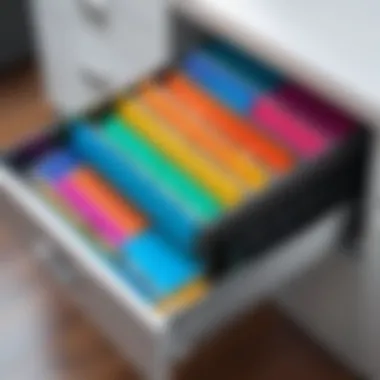 Close-up of a filing drawer organizer with color-coded folders for enhanced efficiency