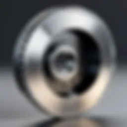 Close-up of a small cutting wheel highlighting its sharp edge and design features