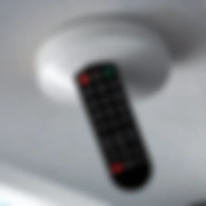 Close-up of remote control for ceiling lighting