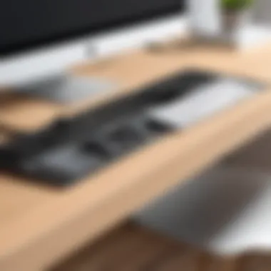 Elegant Cable Management Solution Stylish sticky cable holder affixed to a desk, showcasing neat cable organization.