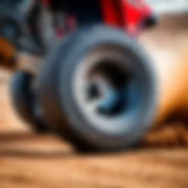 Traxxas Bandit rear tires in action on a dirt track