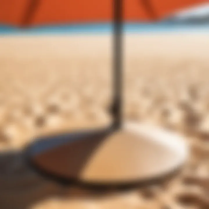 A sand weighted umbrella stand positioned under a large patio umbrella.